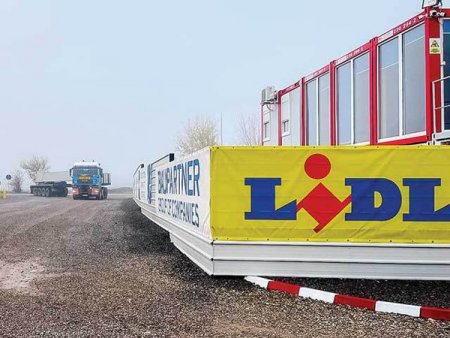<span style='background:#EDF514'>LIDL</span> ridica cel mai mare depozit al companiei in Romania, cu o suprafata de 8 hectare, aproape dubla fata de media celorlalte centre logistice, investitie care ar putea ajunge la 40-50 mil. euro