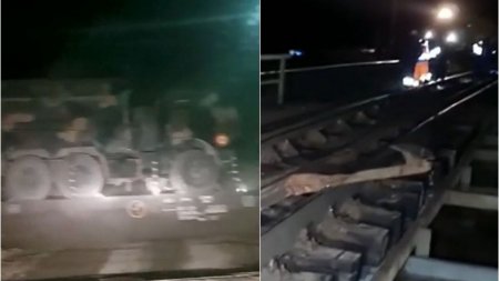 Momentul in care un tren incarcat cu tehnica militar a deraiat si a rupt sina zeci de metri, <span style='background:#EDF514'>IN BRASOV</span>