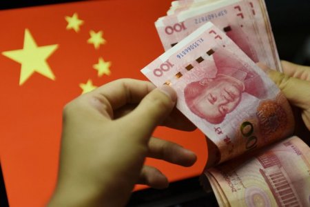 Putin s-a indragostit de moneda chinezeasca: vom promova platile in yuani cu tarile terte