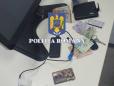 Politist din Bucuresti prins in timp ce primea 10.000 de euro mita, trimis in judecata