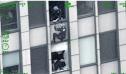Politistul coboara in rapel pe un zgarie-nori pentru a aresta un urmarit FBI care ameninta ca va sari de la etajul 31, la New <span style='background:#EDF514'>YORK</span>