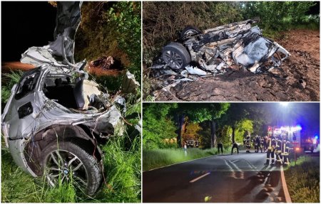 <span style='background:#EDF514'>BMW X</span>3 imposibil de recunoscut dupa ce s-a rupt in doua si a luat foc. Un tata si fiul lui de 12 ani au murit in accidentul din Germania
