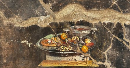 O pizza apare intr-o pictura veche de 2.000 de ani. Arheologii au facut descoperirea la Pompeii