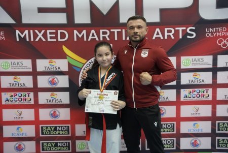 Pe urmele tatalui! Fiica de 11 ani a campionului mondial de la <span style='background:#EDF514'>KEMPO</span> face ravagii pe tatami