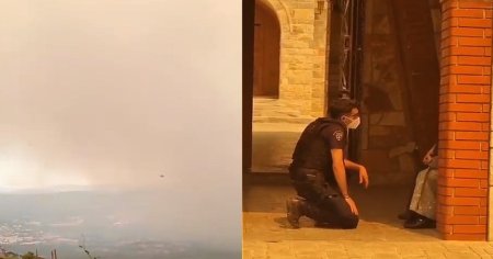 Imagini socante in Grecia mistuita de incendii. Un politist le roaga in genunchi pe calugarite sa evacueze o manastire VIDEO