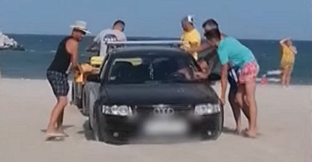 Amenda uriasa primita de un tanar care a ramas blocat cu masina pe plaja. Gestul sau a fost taxat imediat