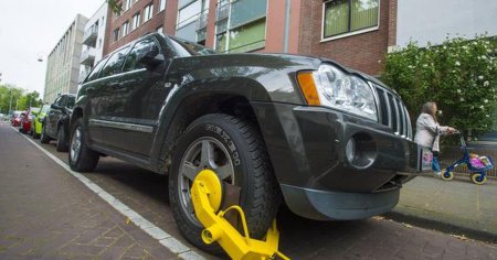 Un roman are 66 de amenzi de parcare neplatite in acelasi oras din Belgia: Le incaseaza de parca ar fi autocolante Panini