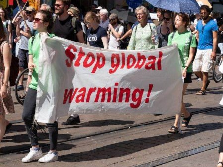 Tens of thousands of people took to the streets for climate...