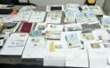 Zeci de documente de identitate au fost descoperite intr-un microbuz de politisti la Vama Giurgiu. VIDEO