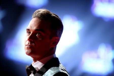 O fana a lui Robbie Williams a murit dupa ce a suferit o cadere la concertul din Sydney al artistului