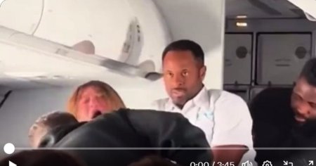 Incident desprins parca din <span style='background:#EDF514'>EXORCIST</span>ul, intr-un avion nevoit sa aterizeze urgent din cauza unei femei posedate VIDEO