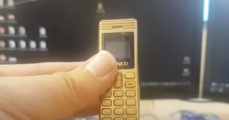 Cel mai mic telefon din lume, creat special pentru detinuti. Cum a fost introdus in Penitenciarul Aiud intr-o ciocolata