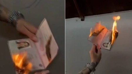 O tanara fotomodel din Rusia risca inchisoarea, dupa ce si-a ars pasaportul la petrecerea de Revelion: Am iesit urat in poza