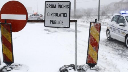 Doua drumuri nationale blocate, doua cu restrictii, din cauza ninsorii viscolite