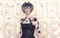Rosamund Pike, aparitie excentrica la <span style='background:#EDF514'>GLOBURILE</span> de Aur. Si-a ascuns chipul, pe care l-a avut „complet distrus” in urma unui accident
