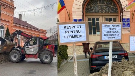Fermierii au turnat mai multe basculante cu pamant in fata Primariei din Arad