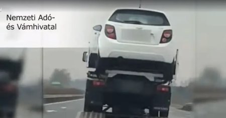 Imagini virale cu un roman prins in Ungaria cand transporta o masina in remorca unui autovehicul aflat pe o platforma VIDEO
