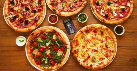 Un iesean a comandat 569 de pizza in 2023 si a adus Romania pe un loc surpriza in topul mondial. Bucurestiul este peste Roma
