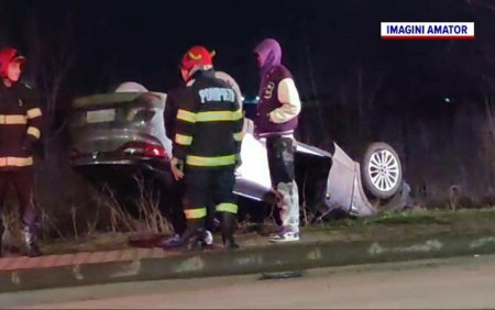 Accident spectaculos in Ilfov. O masina a ajuns cu <span style='background:#EDF514'>ROTILE IN SUS</span>, pe marginea drumului. Cum a fost posibil