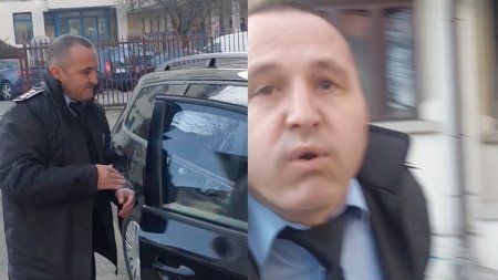 Seful Politiei din Targu Jiu, filmat cand scuipa un cetatean care il intreaba cum a obtinut un teren gratis de la Primarie: 