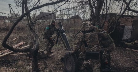 <span style='background:#EDF514'>SOLDA</span>tii ucraineni se antreneaza intr-o baza secreta din estul Angliei, instruiti de personal militar din mai multe tari