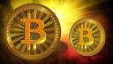 Bitcoin depaseste nivelul de 57.000 de dolari pentru prima data de la sfarsitul anului 2021