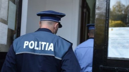 Politist lovit in timpul audierilor, cand incerca sa aplaneze un conflict, in Petrosani