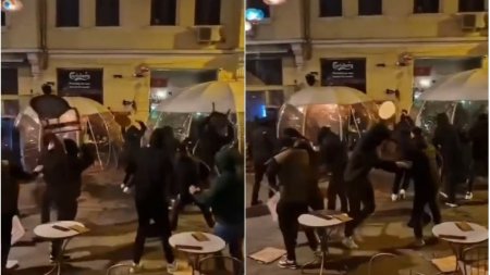 Bataie cu mese si scaune intre suporterii celor doua echipe de fotbal din Craiova. Huliganii care au devastat centrul orasului, cautati de politie