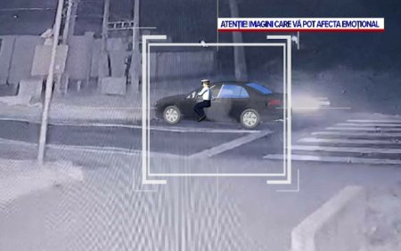 Momentul in care politistul din Arges este tarat cu mana prinsa in portiera masinii soferului drogat mai bine de 1 km. VIDEO