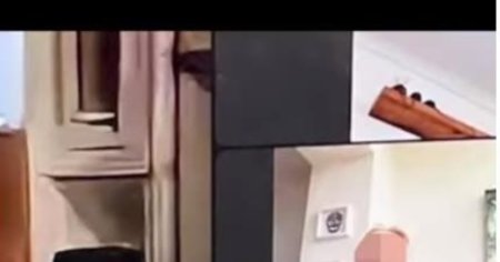 O femeie a intrat live in timpul unei slujbe de in<span style='background:#EDF514'>MORMANT</span>are, in timp ce facea dus. Uitase camera video pornita
