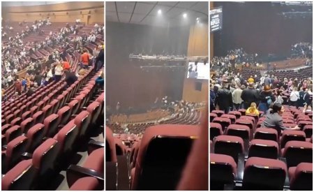 Imagini din sala de concerte de la Moscova. Oamenii s-au baricadat printre scaune cand s-au auzit primele <span style='background:#EDF514'>FOCURI DE ARMA</span>