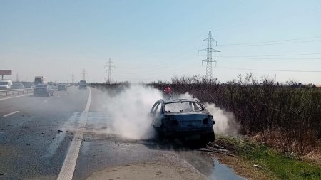 O masina a luat foc pe autostrada A1. Traficul este oprit total pe sensul catre Bucuresti