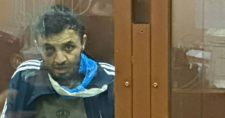 Primii doi suspecti din atacul de la Moscova au fost adusi in fata tribunalului