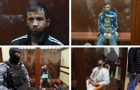 Patru suspecti in cazul atacului asupra salii de concerte din Rusia au fost arestati, sub acuzatia de terorism. Adusi cu ochii vineti si fetele tumefiate in sala de judecata