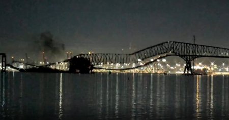 Momentul in care podul din orasul Baltimore se pra<span style='background:#EDF514'>BUSE</span>ste dupa ce a fost lovit de o nava de transport containere VIDEO