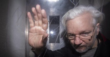 Ex<span style='background:#EDF514'>TRADARE</span>a lui Julian Assange. Justitia britanica solicita noi garantii din partea Statelor Unite