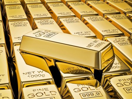 In vremuri tulburi, aurul bate toate recordurile: Activul preferat de refugiu al investitorilor a urcat luni pana la 2265 dolari uncia