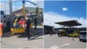 Elicopter filmat intr-o benzinarie din <span style='background:#EDF514'>CURTEA DE ARGES</span>, unde pilotul german a facut plinul, apoi a decolat. VIDEO