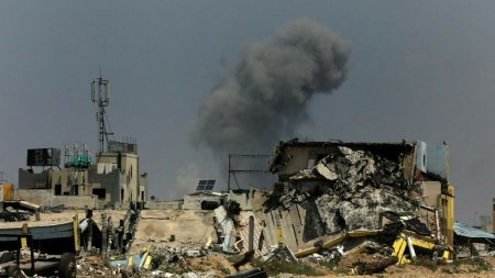 Atac asupra unei ta<span style='background:#EDF514'>BERE</span> de refugiati din Gaza. Cel putin 13 persoane au murit, dintre care 7 copii