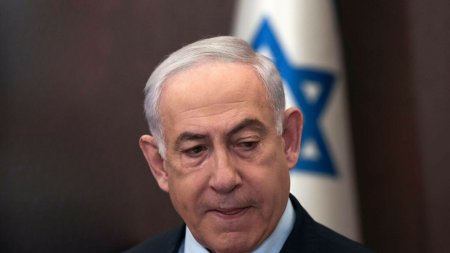 <span style='background:#EDF514'>TURC</span>ia il acuza pe premierul Israelului ca trage regiunea in razboi pentru a ramane la putere