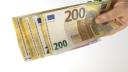 Leul s-a <span style='background:#EDF514'>DEPRECIAT</span> in raport cu euro, dar a crescut fata de dolar