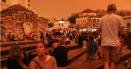 Imagini unice in Atena. Orasul a fost <span style='background:#EDF514'>INGHITIT</span> de o ceata portocalie de la furtuna de nisip din Sahara