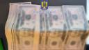 O <span style='background:#EDF514'>TANARA</span> din Bucuresti a furat banii parintilor si a inlocuit bancnotele cu unele false