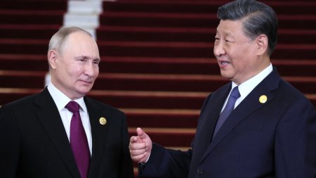 Putin anunta ca se duce intr-o vizita oficiala, in mai, in China. Xi Jin<span style='background:#EDF514'>PING</span> a promis sa consolideze relatia cu Rusia