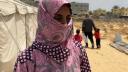 Marturia unei familii care locuieste intr-un cimitir din Rafah. In loc sa se joace, a desenat un cadavru
