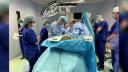 O femeie din Iasi, care a suferit de cancer mamar, a fost operata cu succes de o echipa de medici din SUA si chirurgi romani