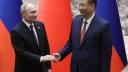 Gestul rar facut Xi Jinping in timpul vizitei lui Vladimir Putin in China. Semnul aratat intregii lumi