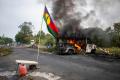 Patru cetateni romani, aflati in Noua Caledonie, in atentia MAE. Teritoriul este devastat de revolte si violente